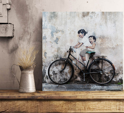 Kids On The Bike by E. Zacharevic, Street Art