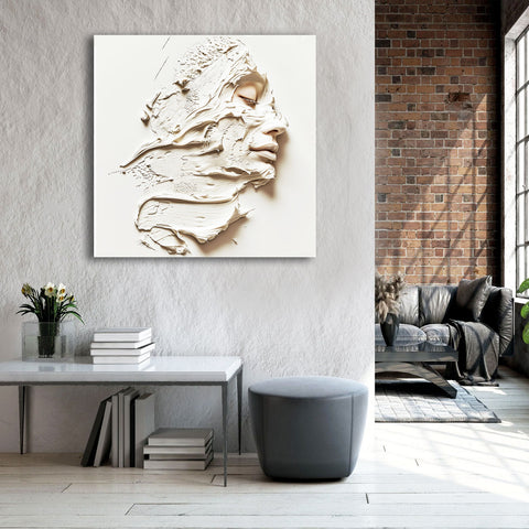 Modern interior with a textured wall art piece of a face.