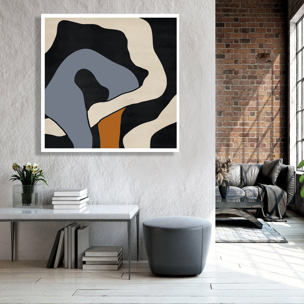 Extra-large abstract art piece on a wall in a modern living room.