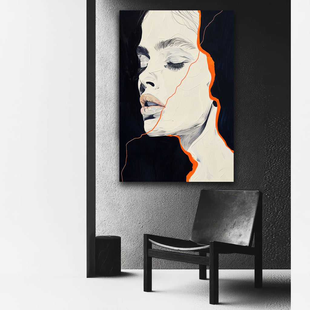 Abstract art piece of a woman's face with a black chair in front on a white wall.