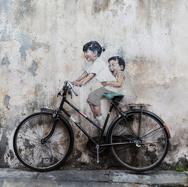 Kids On The Bike by E. Zacharevic, Street Art